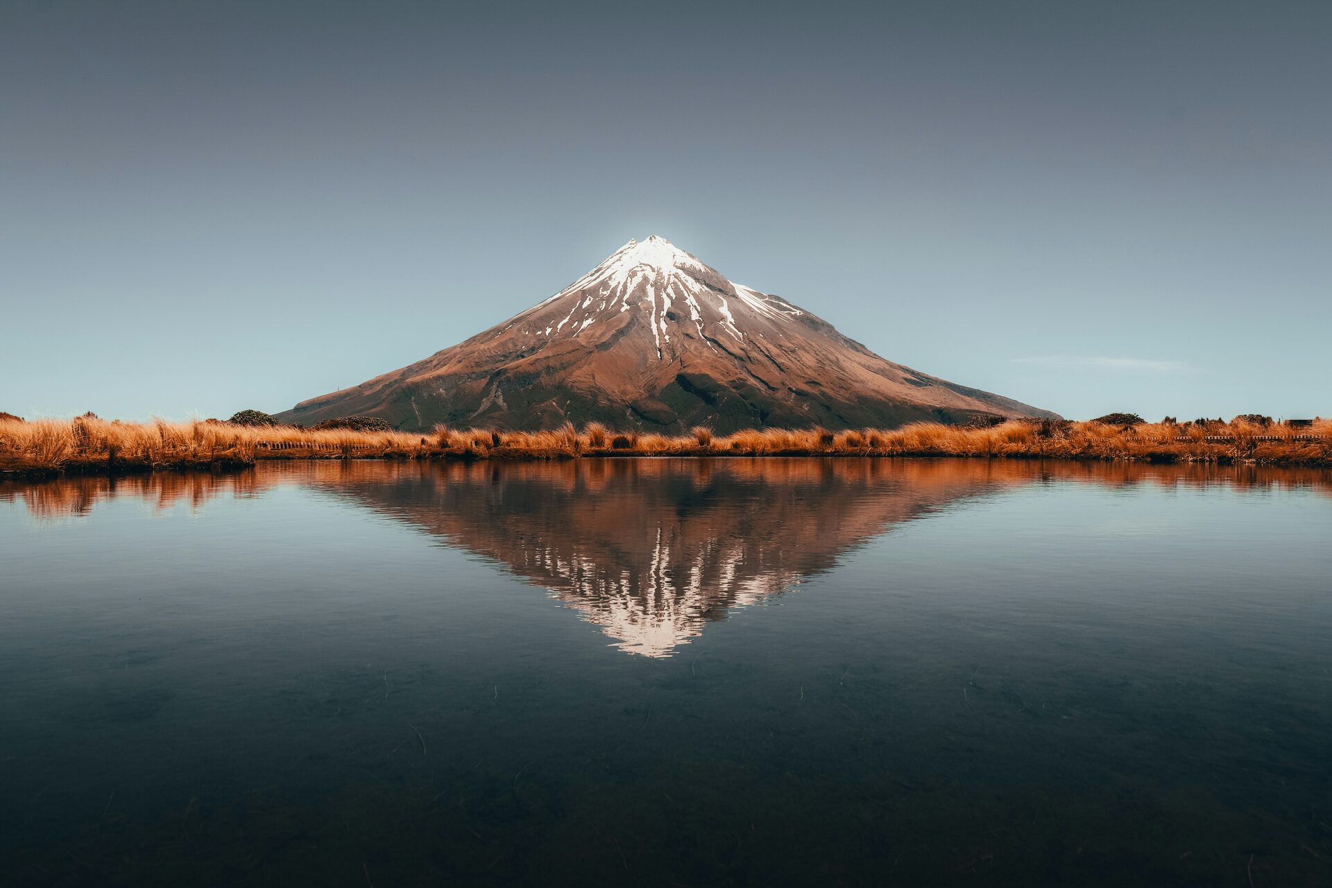 Mount Taranaki reflected in a mountain tarn, South Taranaki
