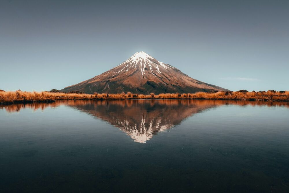 Mount Taranaki reflected in a mountain tarn, Taranaki